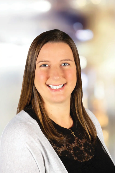 Portrait of Heather Dexter, REALTOR®.